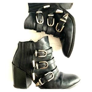 7.5 Baske, Black buckle booties.
